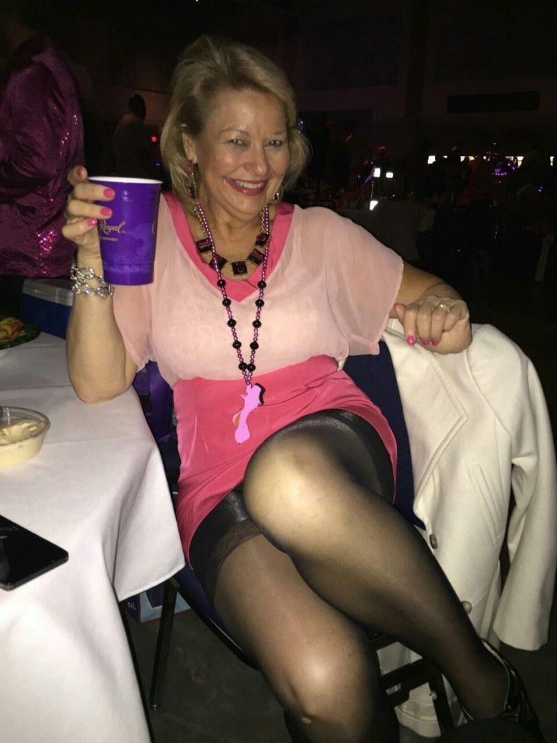 Grandmothers in pantyhose under the skirt