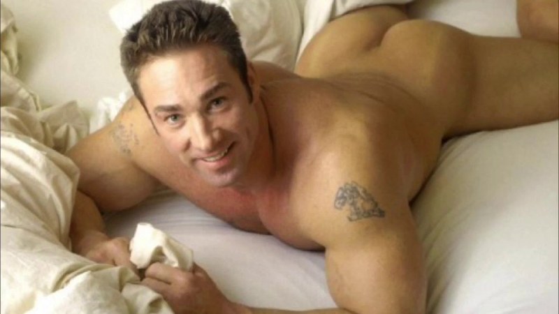 Man in bed from above