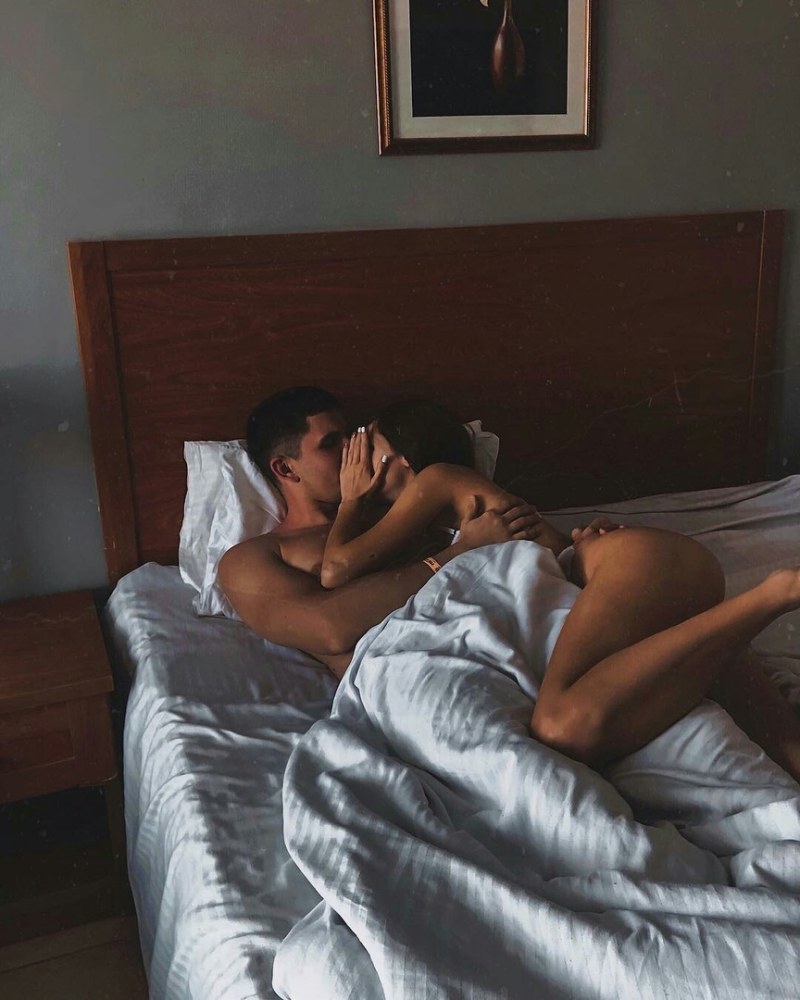 Girl in underwear hugs a man