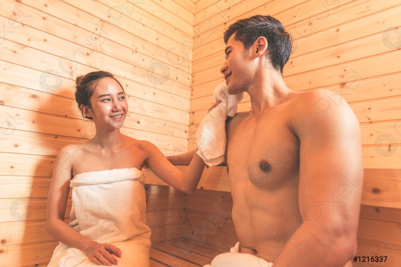 Mature Asian with young in the sauna