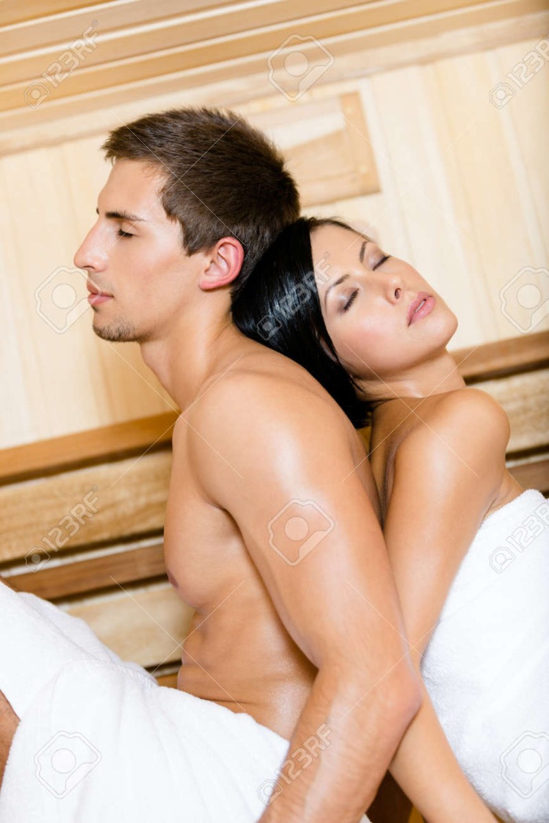 Girl in a sauna with men