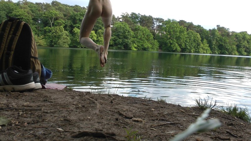 Naked women bathe in the lake
