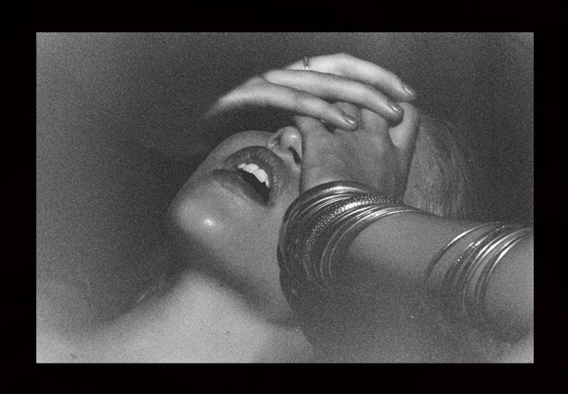 The face of a woman in orgasm art