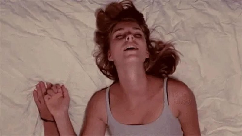 The face of a moaning woman