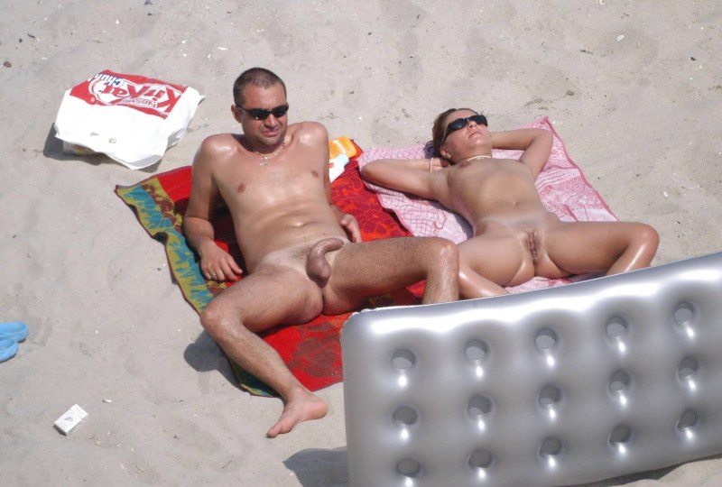 Nudist three on the beach