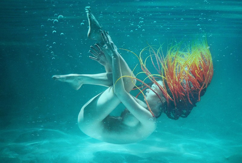 Pregnant women under water with huge tits