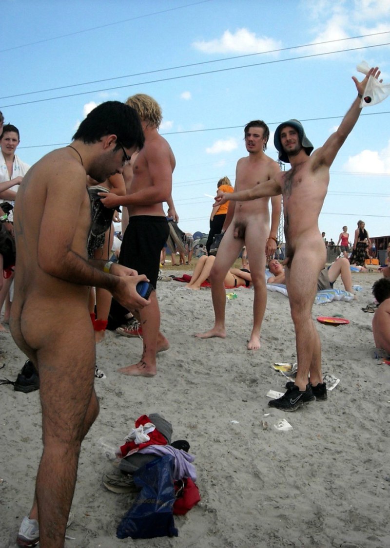 Naked men on a public beach